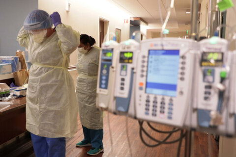 As officials prep for Omicron, US hospitals are still battling severe Delta variant infections