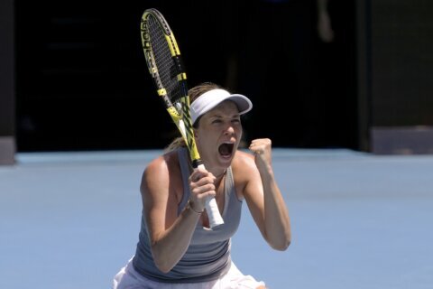 Medvedev saves match point, moves into Australian Open semis