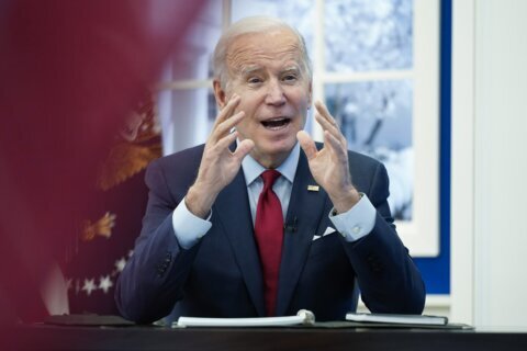 Biden urges concern but not alarm in US as omicron rises
