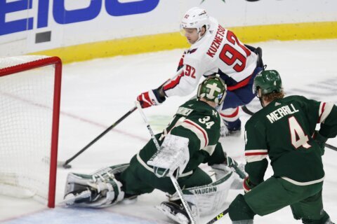 Capitals score on own net; Wild come back to win in shootout