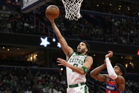 Tatum scores 51 in Celtics’ 116-87 rout of Wizards
