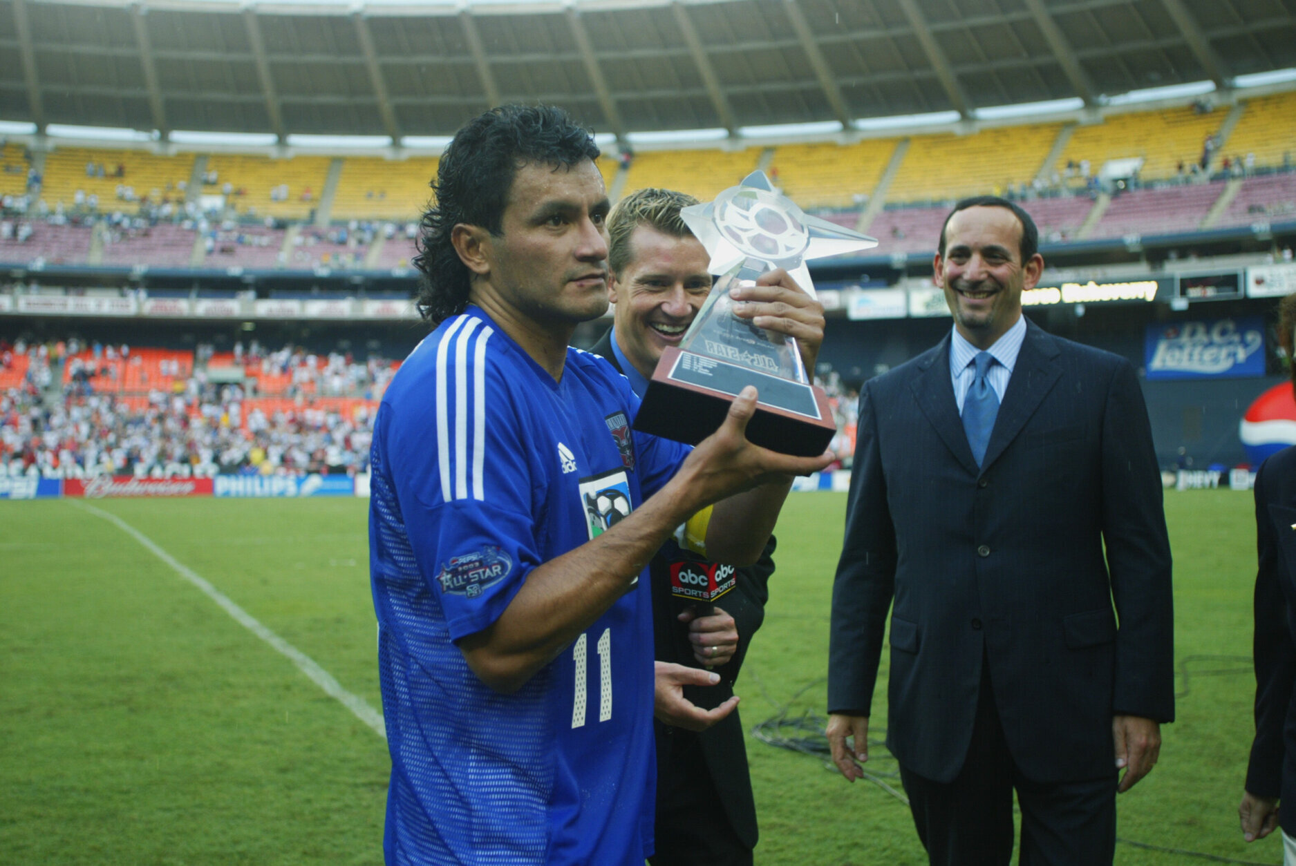 WASHINGTON - AUGUST 3:  Midfielder Marco Etcheverry #11 of the MLS All Stars holds the MVP trophy after the MLS All Star match against the US National Team on August 3, 2002 at RFK Stadium in Washington, D.C.  The MLS All Stars defeated the US National Team 3-2.  (Photo by Jamie Squire/Getty Images)