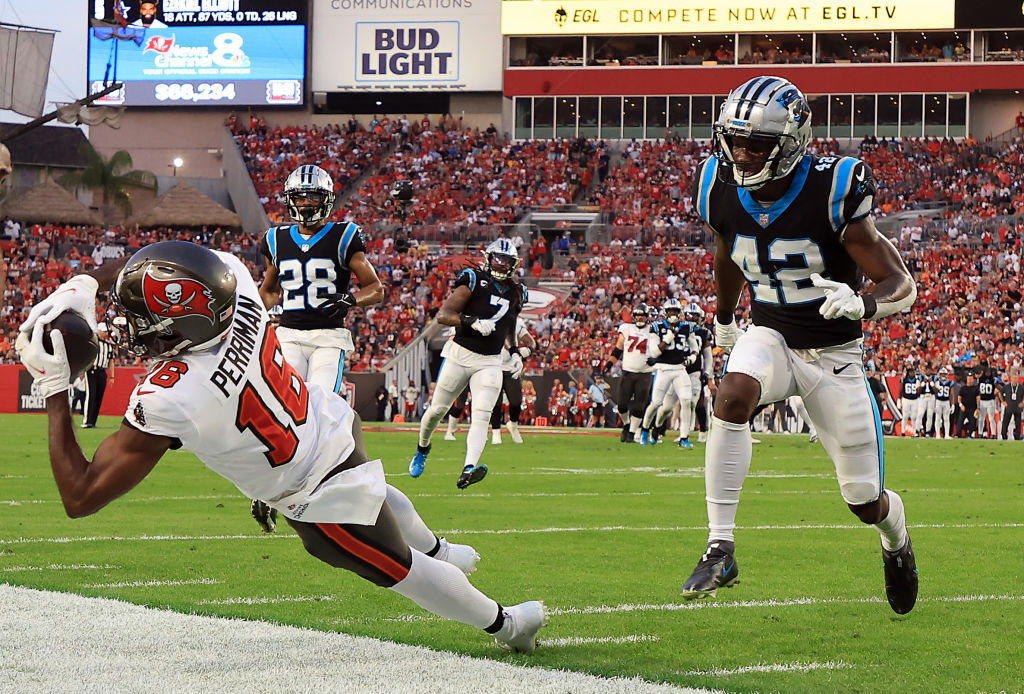 <p><em><strong>Panthers 17</strong></em><br />
<em><strong>Bucs 41</strong></em></p>
<p>I never thought anyone would put his position&#8217;s all-time numbers as far out of reach as Jerry Rice has for receivers — and then Tom Brady happened. <a href="https://www.nfl.com/news/tom-brady-passing-yards-2021-nfl-season" target="_blank" rel="noopener">Not only is he doing it for QBs</a>, he&#8217;s also <a href="https://ftw.usatoday.com/2022/01/tom-brady-rob-gronkowski-gronk-bonus-incentive-video-reaction-1-million-bucs" target="_blank" rel="noopener">jacked up Gronk&#8217;s numbers in both the record book and the pocket book</a>. This man ain&#8217;t human.</p>
<p>Matt Rhule, however, is quite mortal. If he tries to <a href="https://www.espn.com/nfl/story/_/id/33025887/carolina-panthers-expected-target-jay-gruden-bill-obrien-offensive-coordinator-search-sources-say" target="_blank" rel="noopener">save his job with another recycled Gruden</a>, he might as well just quit now and collect his severance until his inevitable pursuit of the next high-profile college gig.</p>
