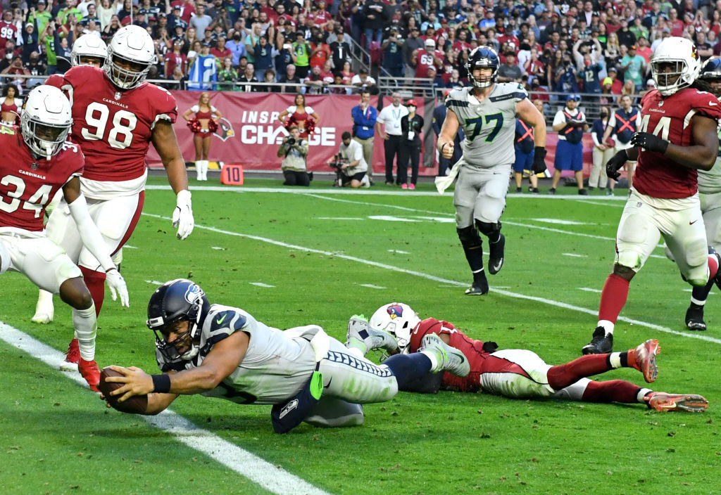 <p><em><strong>Seahawks 38</strong></em><br />
<em><strong>Cardinals 30</strong></em></p>
<p>If this was Russell Wilson&#8217;s final act as a Seattle Seahawk, what a way to go out. Russ&#8217; next move will be one of the three biggest storylines of the 2022 offseason.</p>
<p>Meanwhile, Arizona is limping into the playoffs having lost four of its final five games, but got the best possible playoff matchup: The same Rams team every bit as suspect as they are, and just happened to beat in L.A. as part of the Cards&#8217; 7-0 start. The winner of this game is a divisional round sacrificial lamb.</p>
