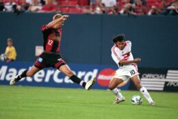 21 Jun 2000:  Marco Etcheverry #10 of the D. C. United steals control of the ball from Mike Petke #12 of the New York/New Jersey MetroStars during the game at Giants Stadium in East Rutherford, New Jersey.  The United tied with the MetroStars 2-2. Mandatory Credit: Jamie Squire  /Allsport