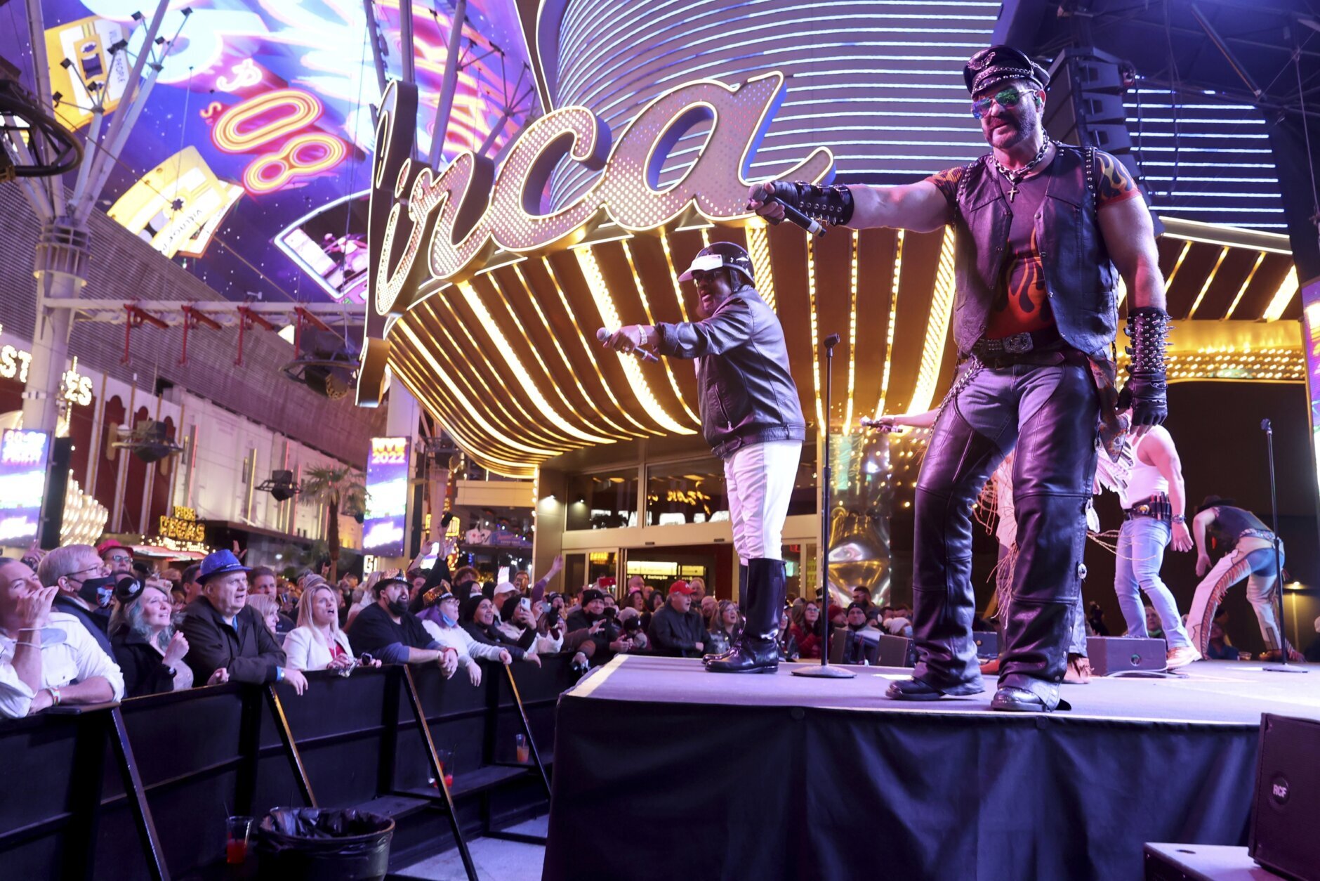 The Village People perform on New Year's Eve at the Fremont Street Experience in downtown Las Vegas Friday, Dec. 31, 2021. (K.M. Cannon/Las Vegas Review-Journal via AP)