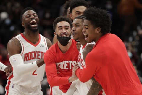 Porter hits 3 with 0.4 left, Rockets beat Wizards 114-111