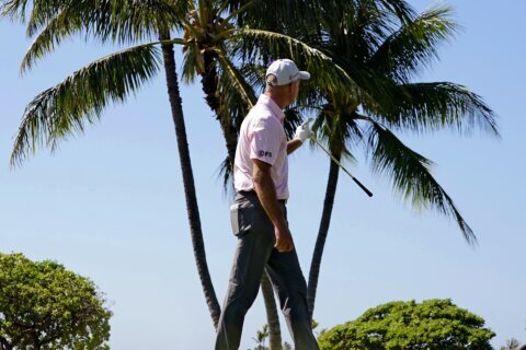 Defending champion Na with another 61 leads Sony Open