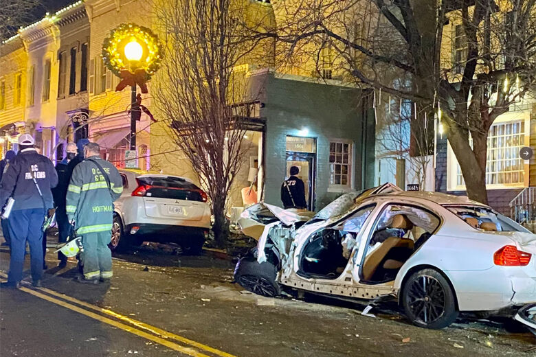 car is seen after crashing into Wisconsin Avenue business
