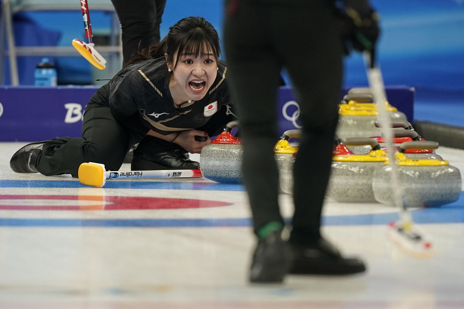 <p>Japan&#8217;s Chinami Yoshida yells to her teammates during a women&#8217;s curling match against Denmark at the Beijing Winter Olympics Saturday, Feb. 12, 2022, in Beijing.</p>
