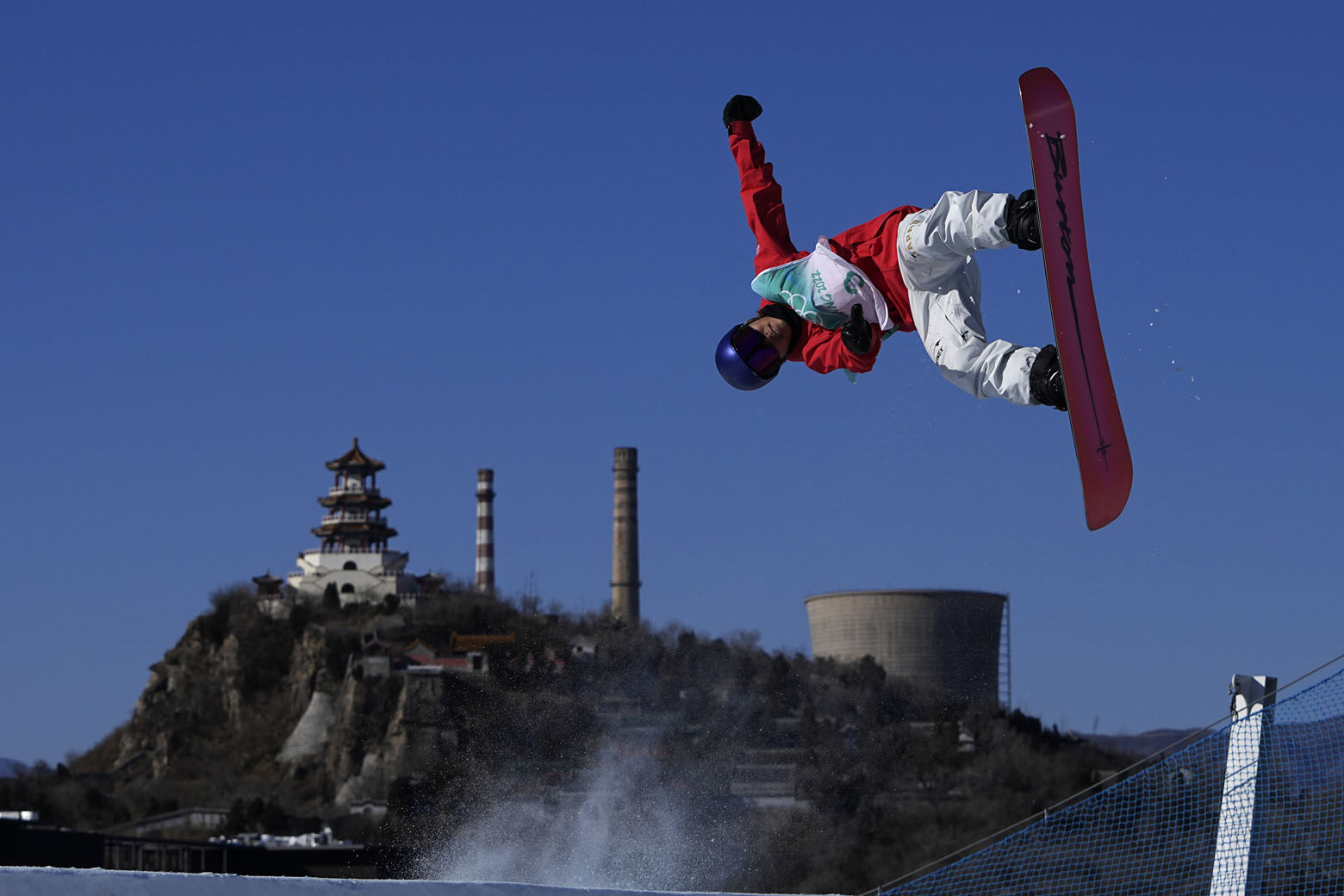 <p>Takeru Otsuka of Japan competes during the men&#8217;s snowboard big air qualifications of the 2022 Winter Olympics, Monday, Feb. 14, 2022, in Beijing.</p>
