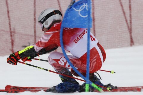 Swiss skier Odermatt handles expectations, wins Olympic gold
