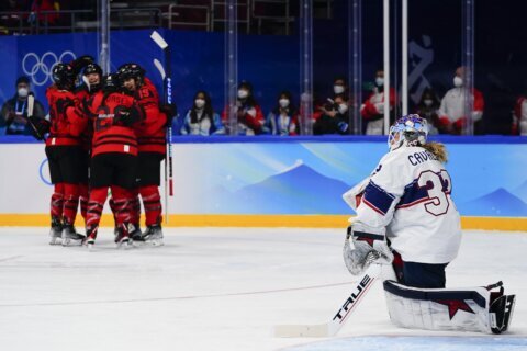 Poulin leads Canada women to Olympic gold in 3-2 win over US