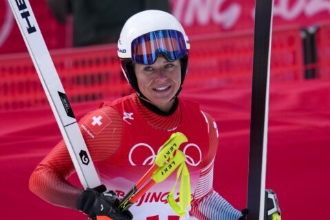 On bad knee, Goggia gets Olympic downhill silver; Suter wins