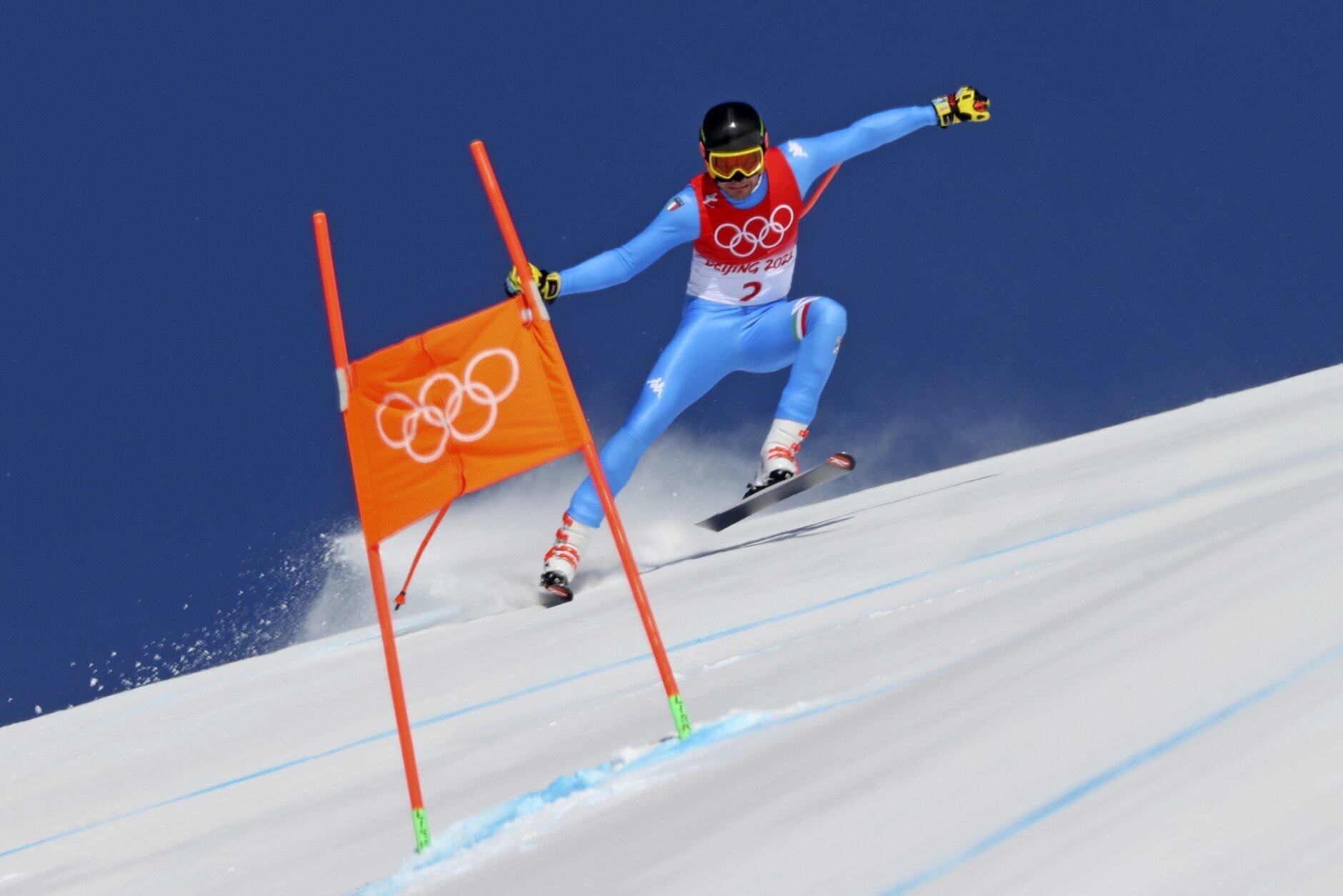 Christof Innerhofer, of Italy makes a turn during men's downhill training at the 2022 Winter Olympics, Saturday, Feb. 5, 2022, in the Yanqing district of Beijing. (AP Photo/Alessandro Trovati)