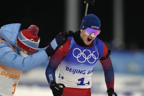 Norway takes Olympic gold in 3-way sprint in biathlon relay