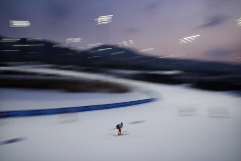 AP PHOTOS: Olympic pursuits of glory, captured in a blur