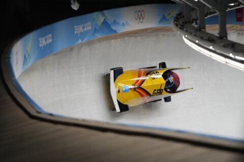 Germany holds 3 of top 4 spots at Olympic two-man midpoint