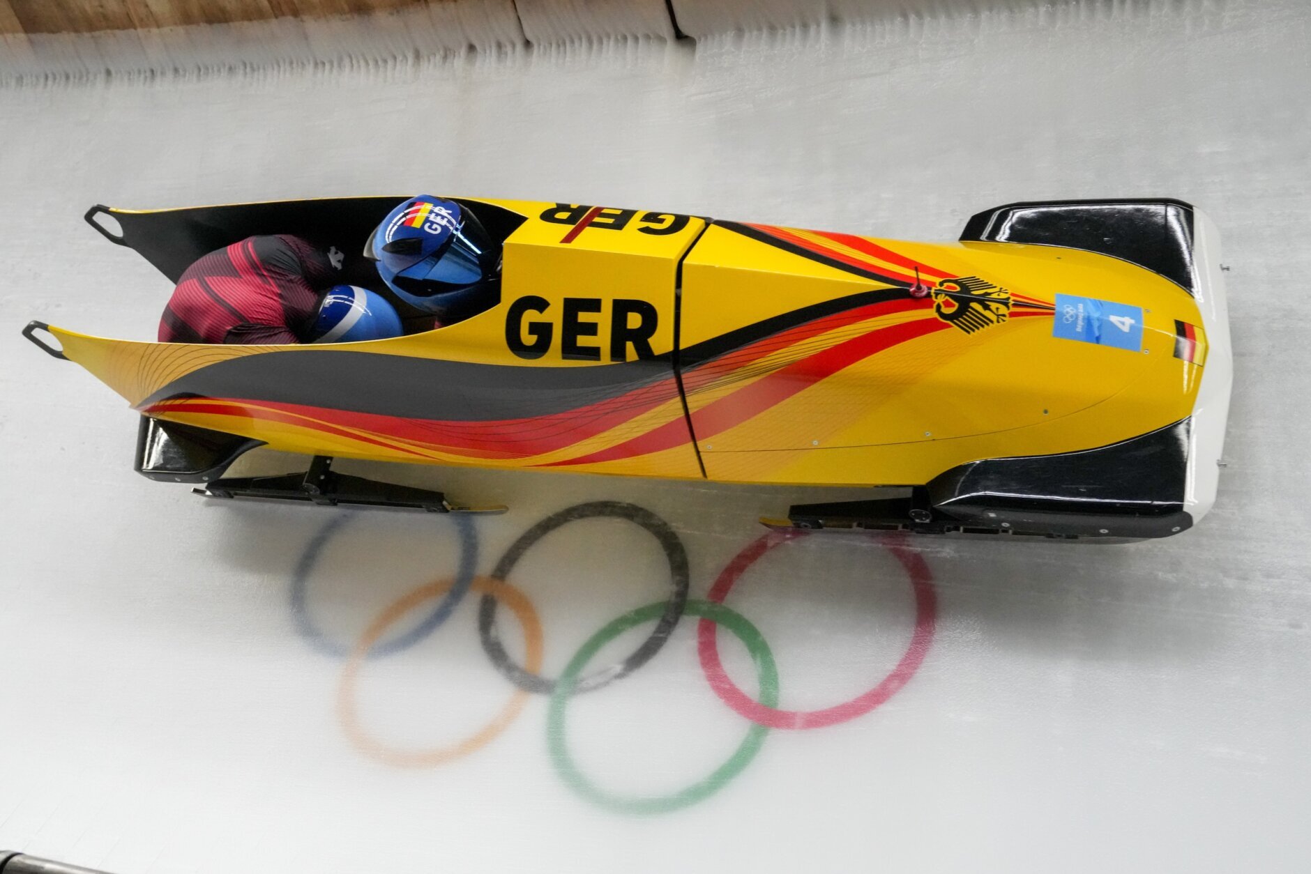 <p>Francesco Friedrich and Thorsten Margis, of Germany, slide during the 2-man heat 1 at the 2022 Winter Olympics, Monday, Feb. 14, 2022, in the Yanqing district of Beijing.</p>
