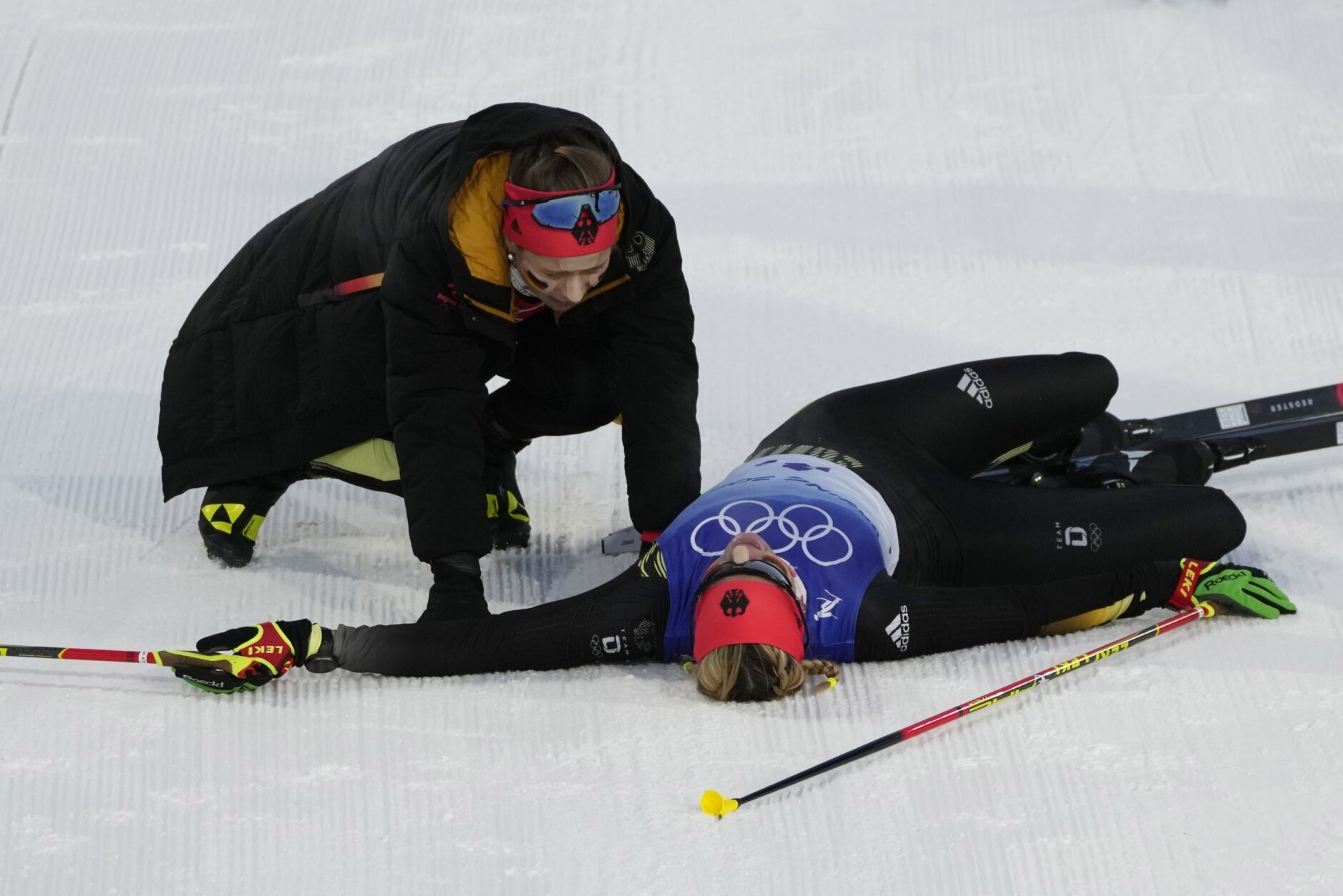 <p>Victoria Carl, of Germany, left, celebrates with teammate Katharina Hennig after the women&#8217;s team sprint classic cross-country skiing competition at the 2022 Winter Olympics, Wednesday, Feb. 16, 2022, in Zhangjiakou, China.</p>
