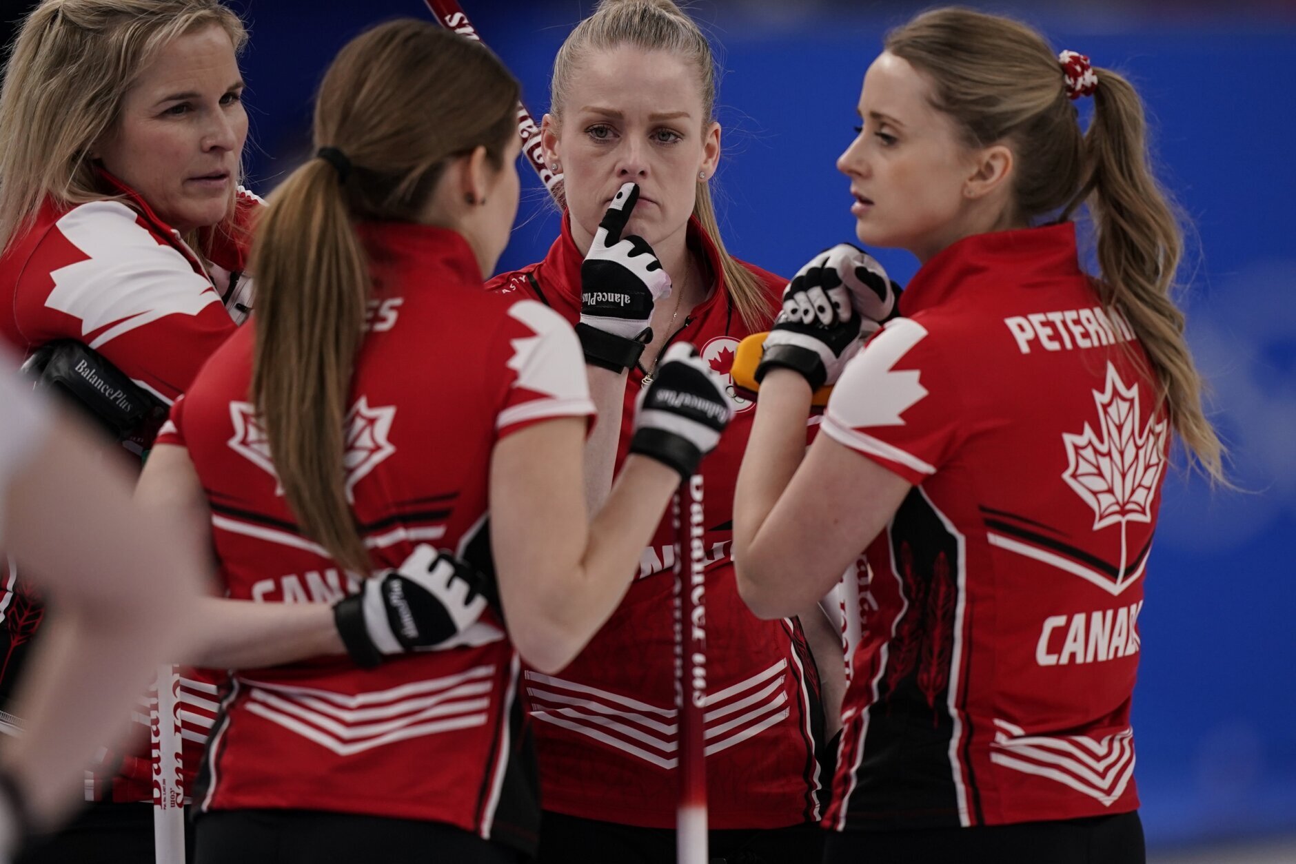<p>Team Canada talk between ends during a women&#8217;s curling match against the Russian Olympic Committee at the Beijing Winter Olympics Monday, Feb. 14, 2022, in Beijing.</p>
