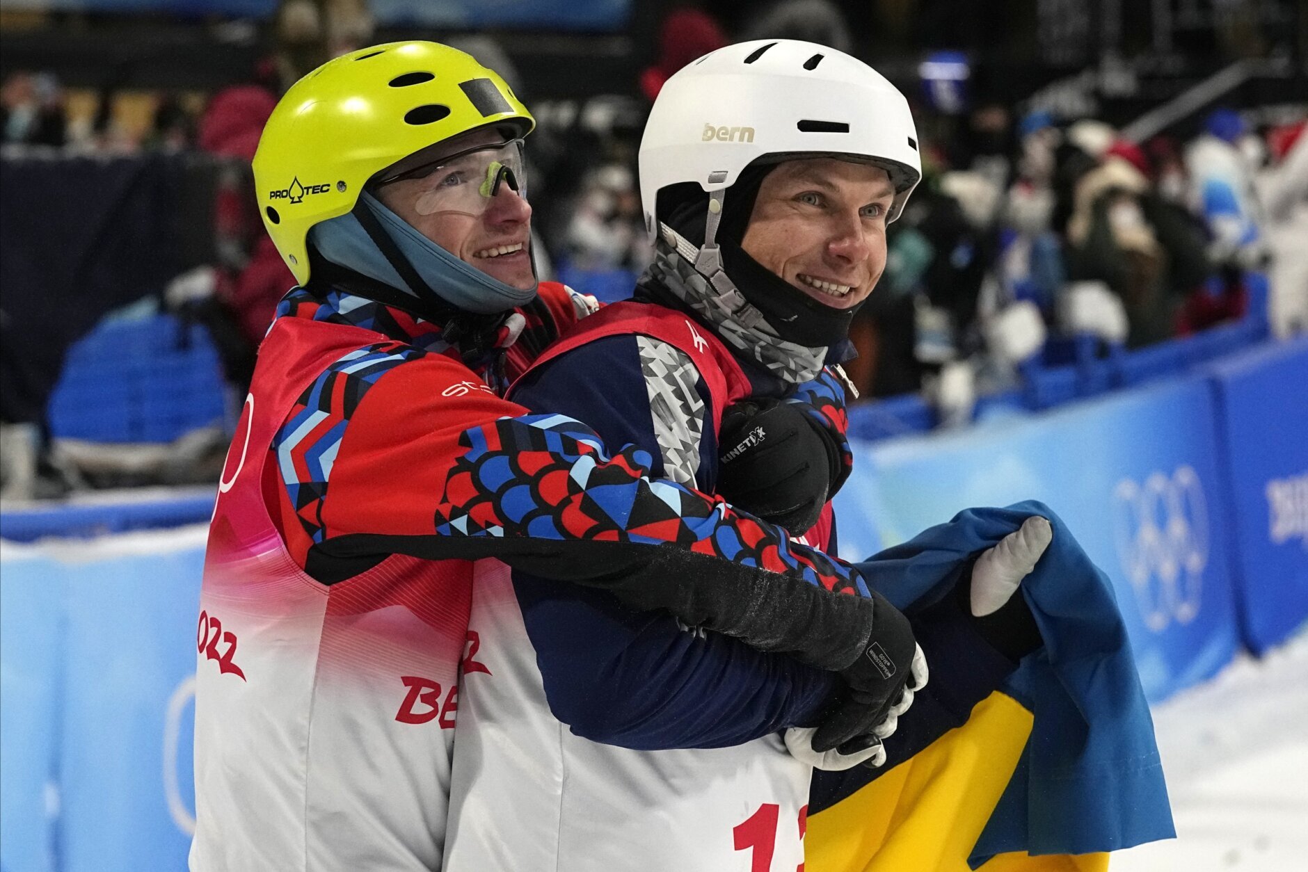 Two athletes hugging