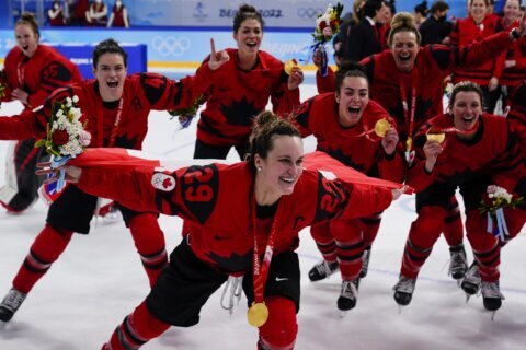 AP PHOTOS: Valieva, Shiffrin stumble on Day 13 of Olympics