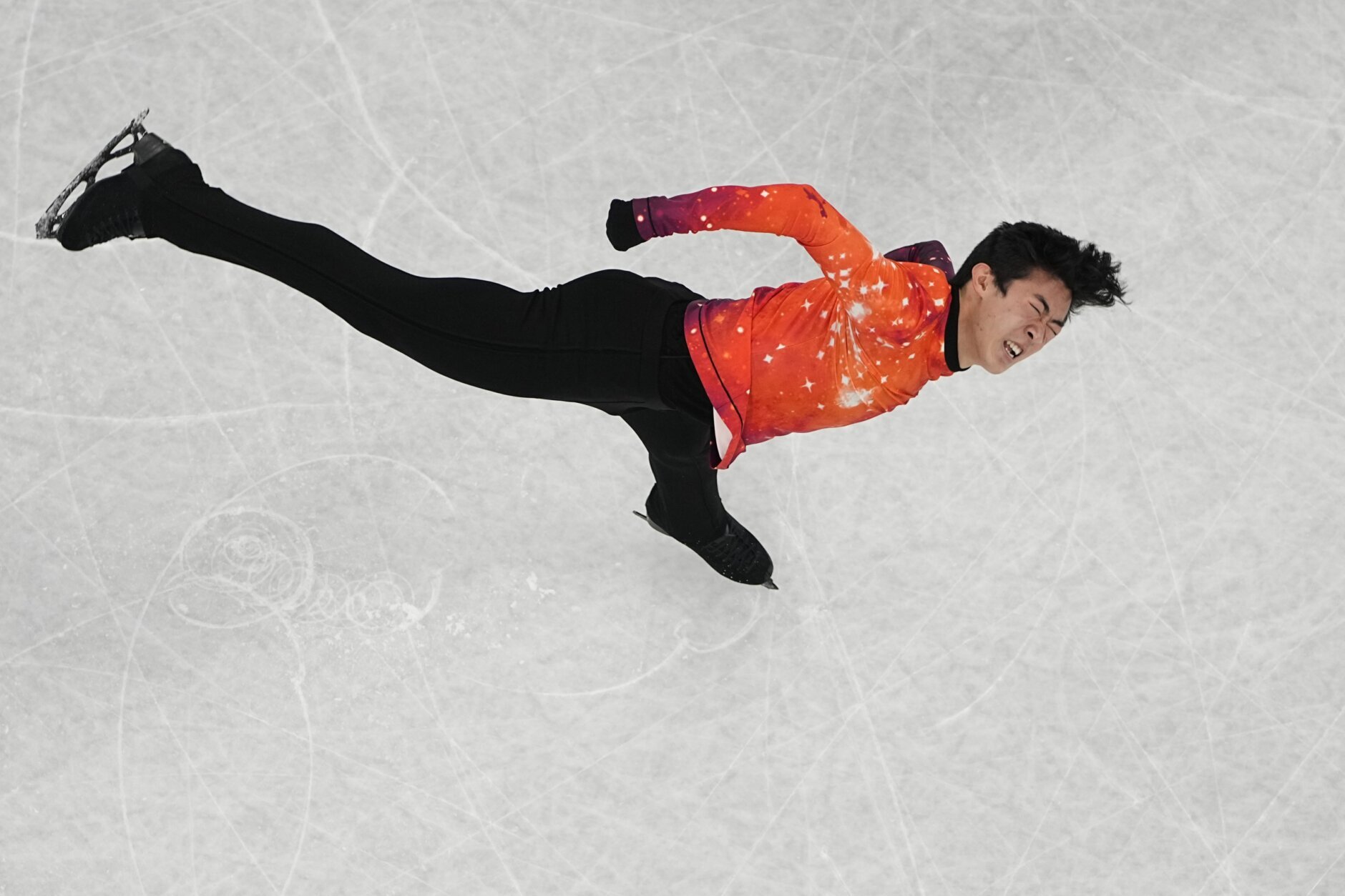 Nathan Chen, of the United States, competes in the men's free skate program during the figure skating event at the 2022 Winter Olympics, Thursday, Feb. 10, 2022, in Beijing. (AP Photo/Jeff Roberson)