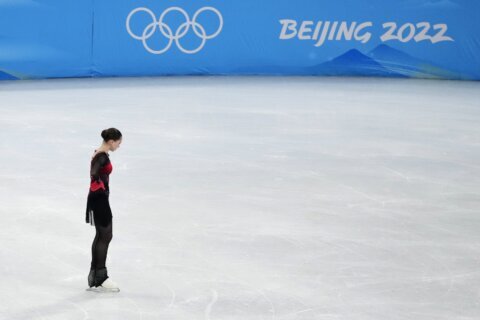 Column: Olympic ideal exposed as farce on sad night in China