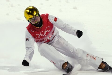 China’s Qi quint-twists to gold in Olympic men’s aerials