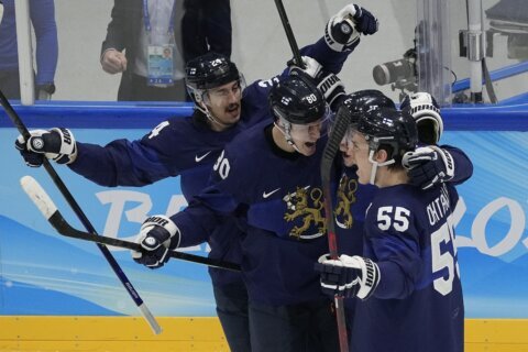 Finland beats Russians for its 1st Olympic hockey gold medal