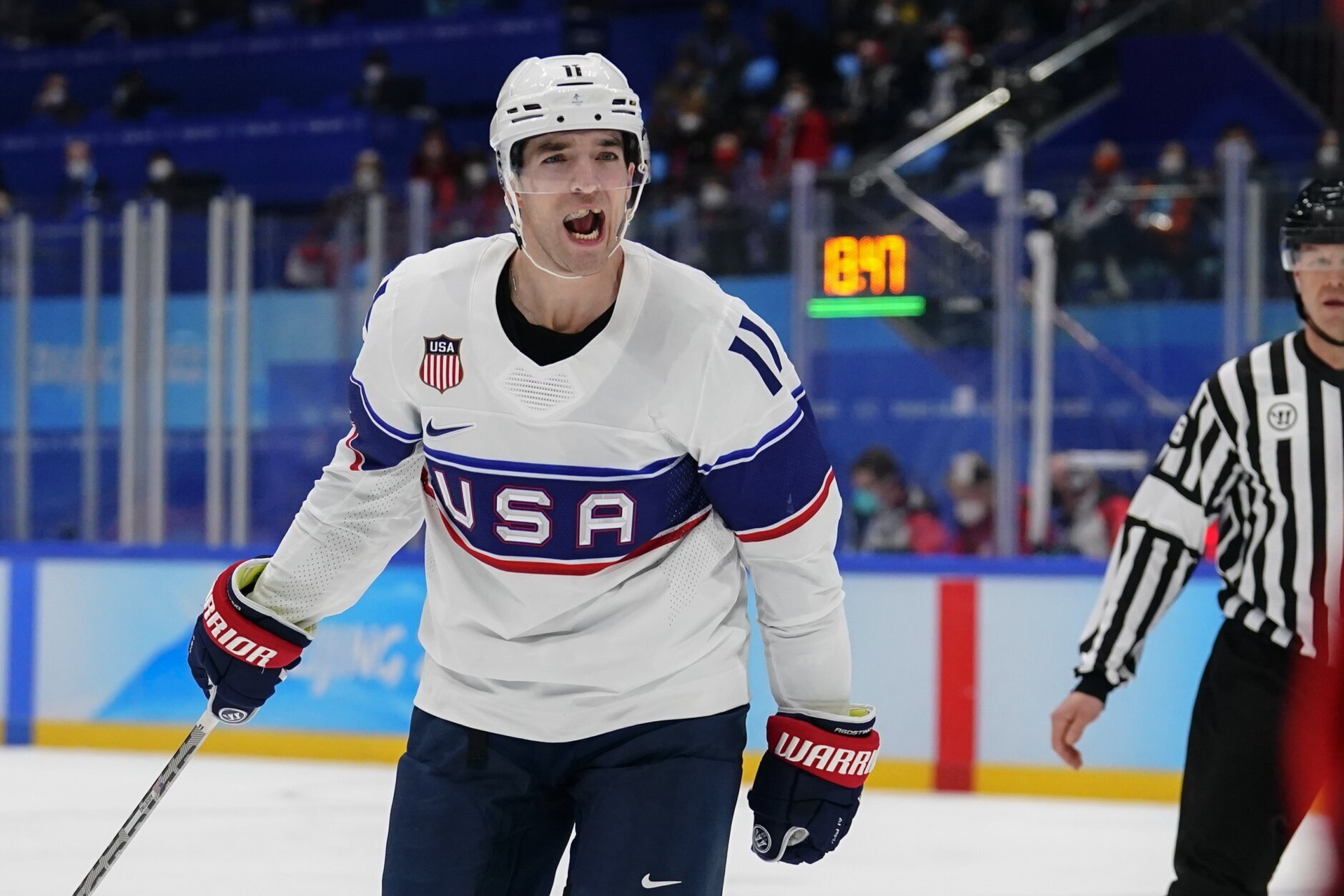 <p>United States&#8217; Kenny Agostino celebrates after scoring a goal against Canada during a preliminary round men&#8217;s hockey game at the 2022 Winter Olympics, Saturday, Feb. 12, 2022, in Beijing.</p>
