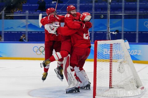 Favored Russians back in final at Olympics, now face Finland