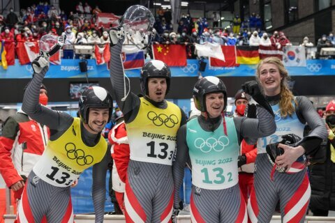 Germany wins Olympic relay, sweeps luge gold medals