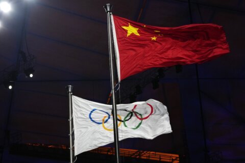 BEIJING SNAPSHOT: At Olympics, differing views of the news