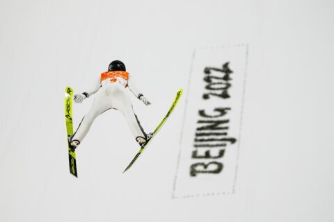 Slovenia wins Olympic debut of ski jumping mixed team event
