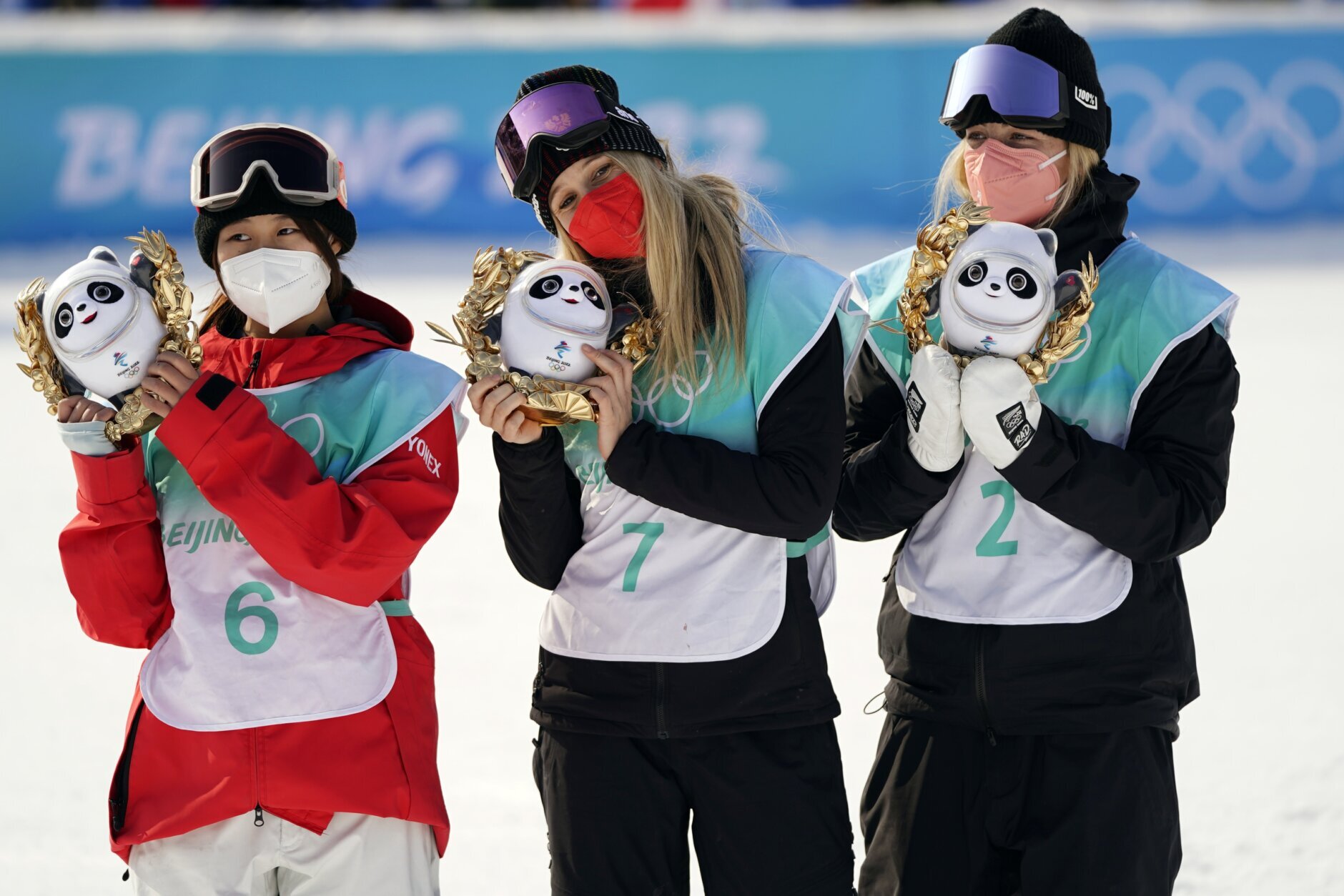 <p>Bronze medalist, from left, Kokomo Murase of Japan, gold medalist Anna Gasser of Austria, and silver medalist Zoi Sadowski Synnott of New Zealand, pose during a venue ceremony for the women&#8217;s snowboard big air finals of the 2022 Winter Olympics, Tuesday, Feb. 15, 2022, in Beijing.</p>
