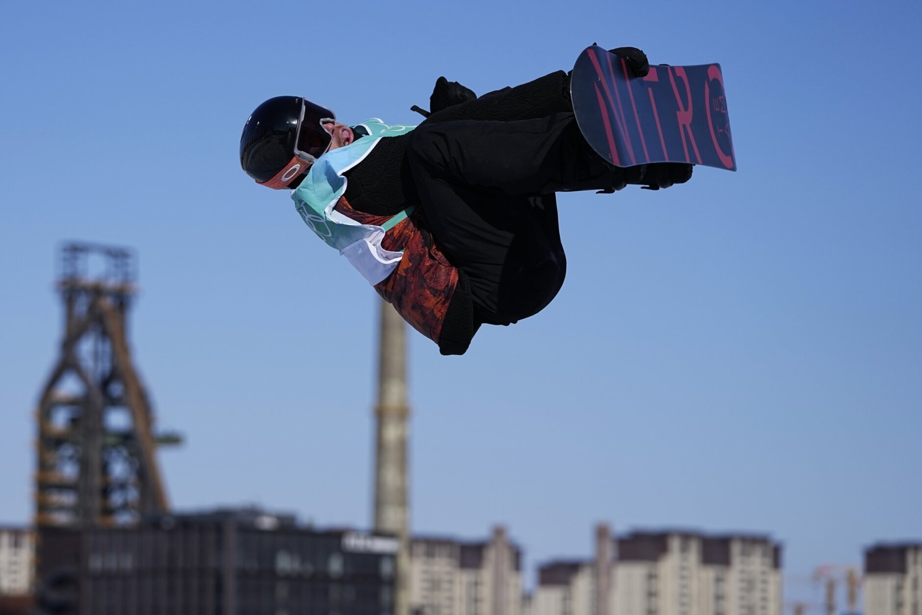 <p>Sebastien Toutant of Canada competes during the men&#8217;s snowboard big air qualifications of the 2022 Winter Olympics, Monday, Feb. 14, 2022, in Beijing.</p>
