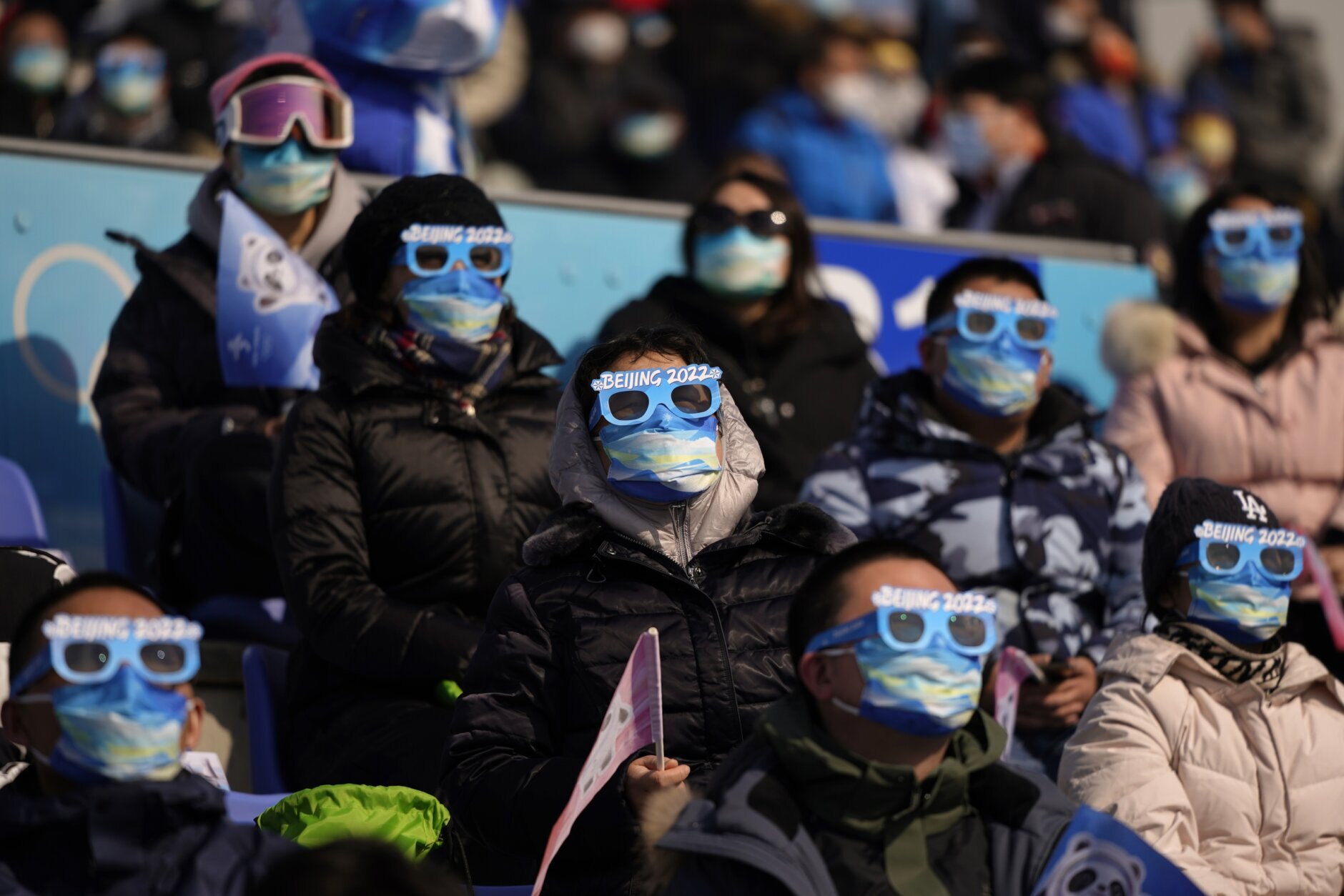 <p>Spectators watch the men&#8217;s snowboard big air finals of the 2022 Winter Olympics, Tuesday, Feb. 15, 2022, in Beijing.</p>

