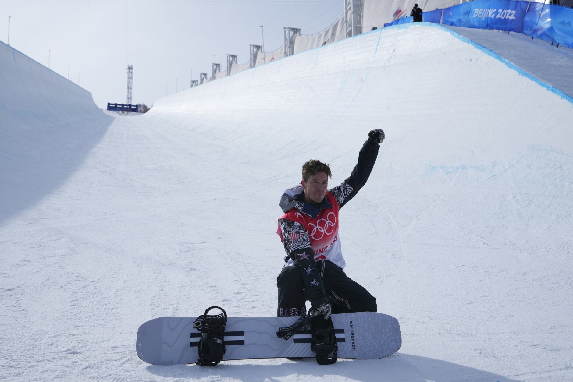 United States' Shaun White poses in the halfpipe course after the men's halfpipe finals at the 2022 Winter Olympics, Friday, Feb. 11, 2022, in Zhangjiakou, China. (AP Photo/Lee Jin-man)