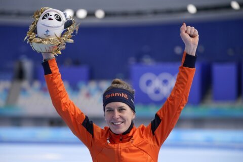 Wüst skates into history with another golden Olympic moment