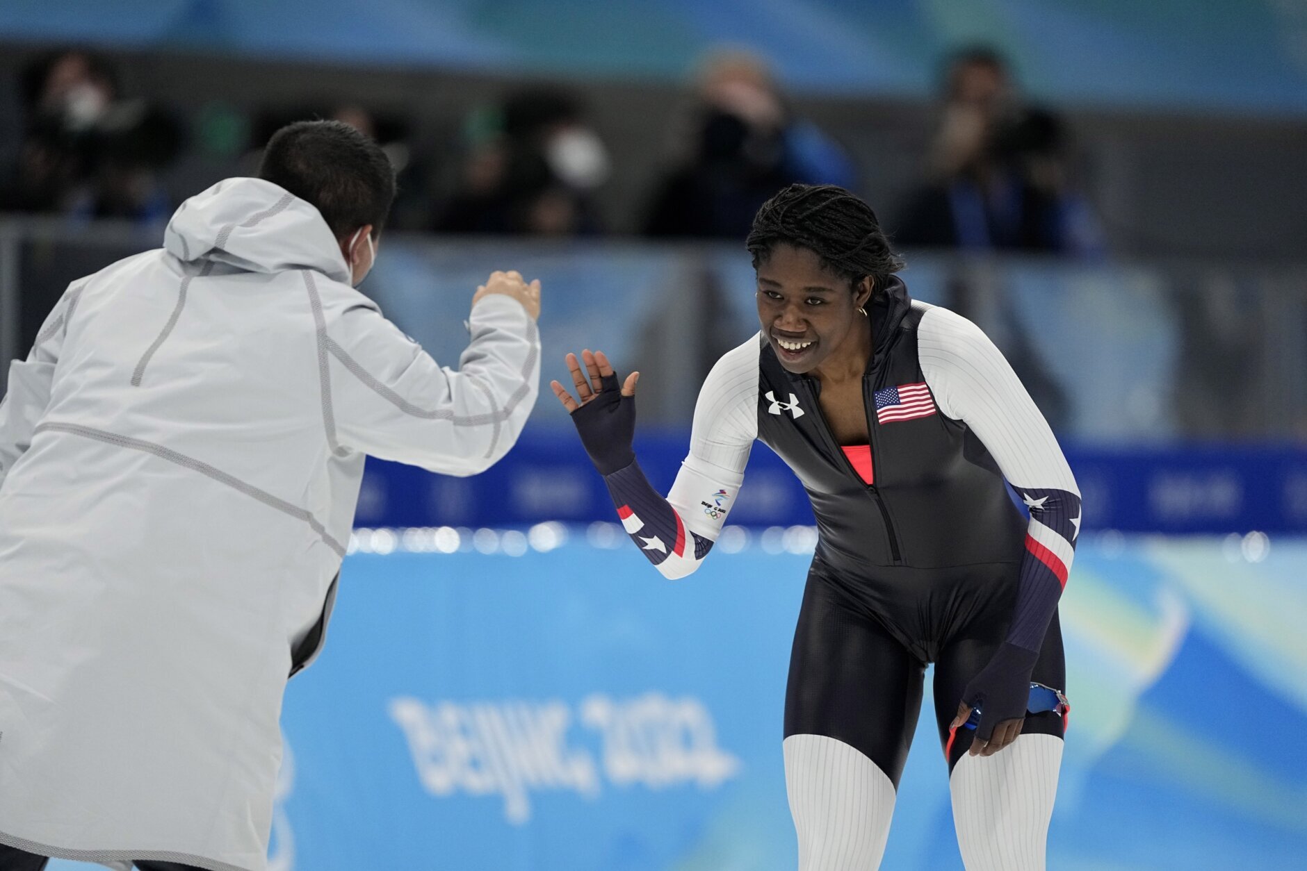 <p>Erin Jackson of the United States reacts with coach Ryan Shimabukuro after winning the gold medal in the speedskating women&#8217;s 500-meter race at the 2022 Winter Olympics, Sunday, Feb. 13, 2022, in Beijing.</p>

