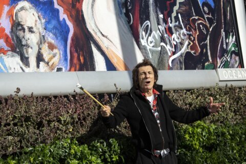 Ronnie Wood unveils Rolling Stones artwork, talks tour hopes