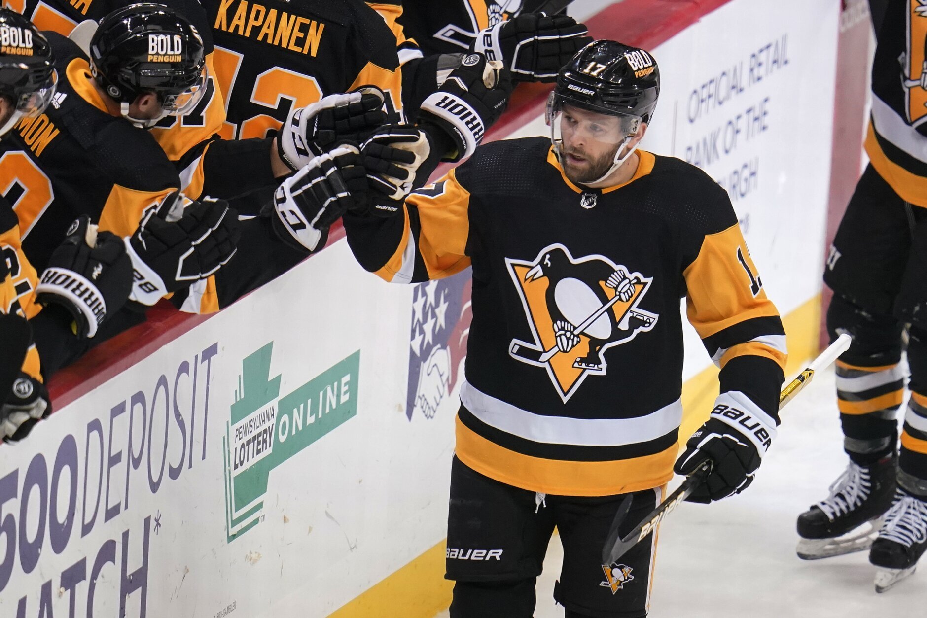Pittsburgh Penguins' Bryan Rust (17) celebrates his goal with Sidney Crosby  during the first period of an NHL hockey game against the Boston Bruins in  Pittsburgh, Saturday, April 1, 2023. (AP Photo/Gene