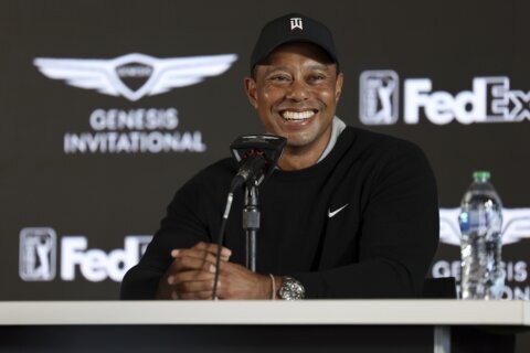 Woods back on the PGA Tour but only as a tournament host