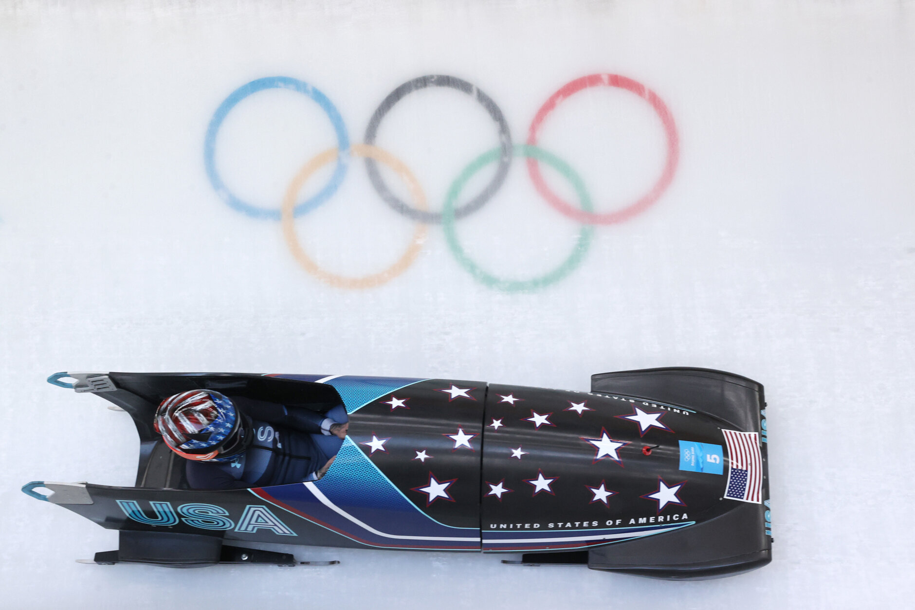 YANQING, CHINA - FEBRUARY 14:  Kaillie Humphries of Team United States slides during the Women's Monobob Bobsleigh Heat 4 on day 10 of Beijing 2022 Winter Olympic Games at National Sliding Centre on February 14, 2022 in Yanqing, China. (Photo by Alex Pantling/Getty Images)