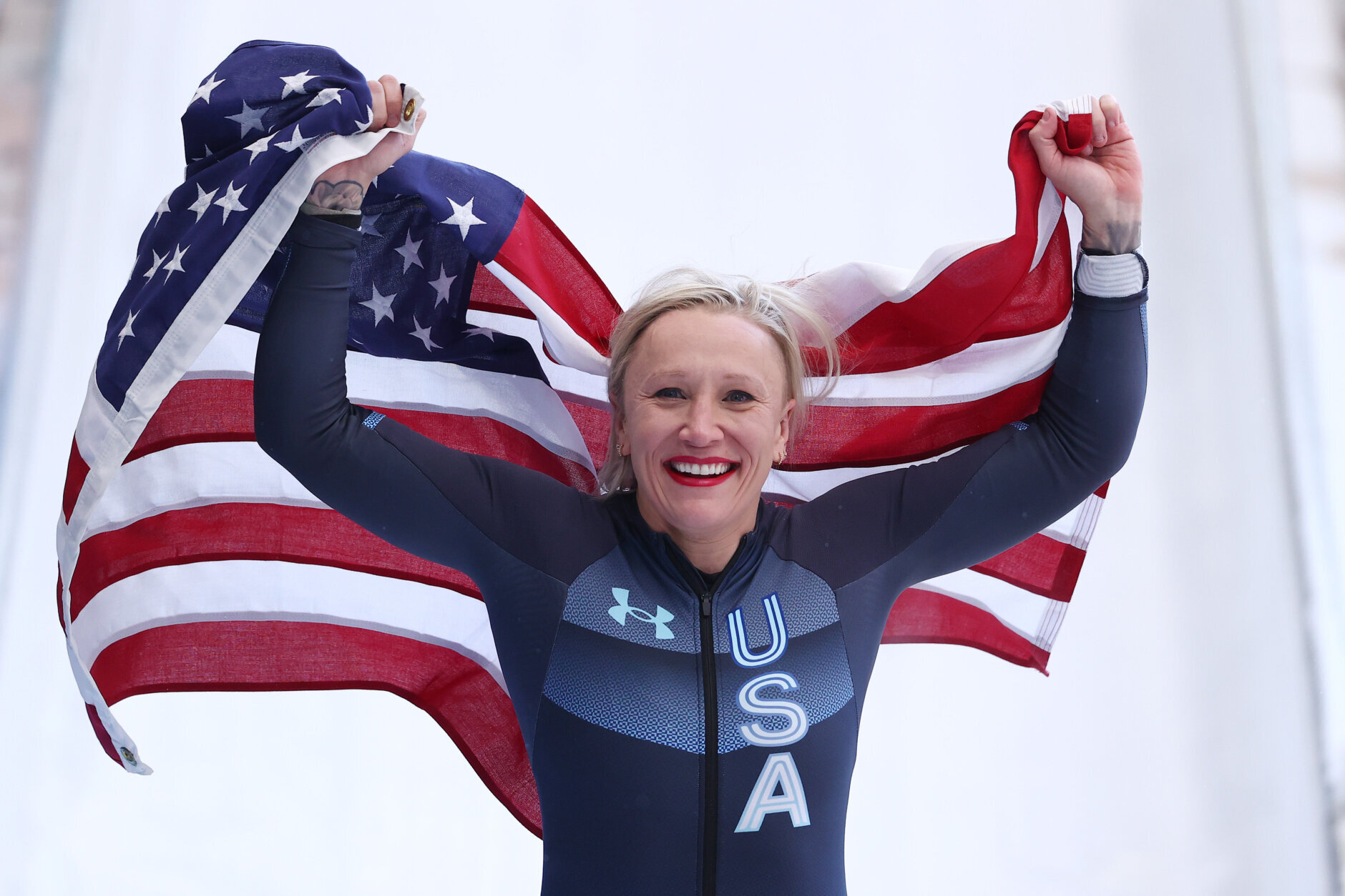 YANQING, CHINA - FEBRUARY 14:  Gold medallist Kaillie Humphries of Team United States celebrates during the Women's Monobob Bobsleigh Heat 4 on day 10 of Beijing 2022 Winter Olympic Games at National Sliding Centre on February 14, 2022 in Yanqing, China. (Photo by Julian Finney/Getty Images)
