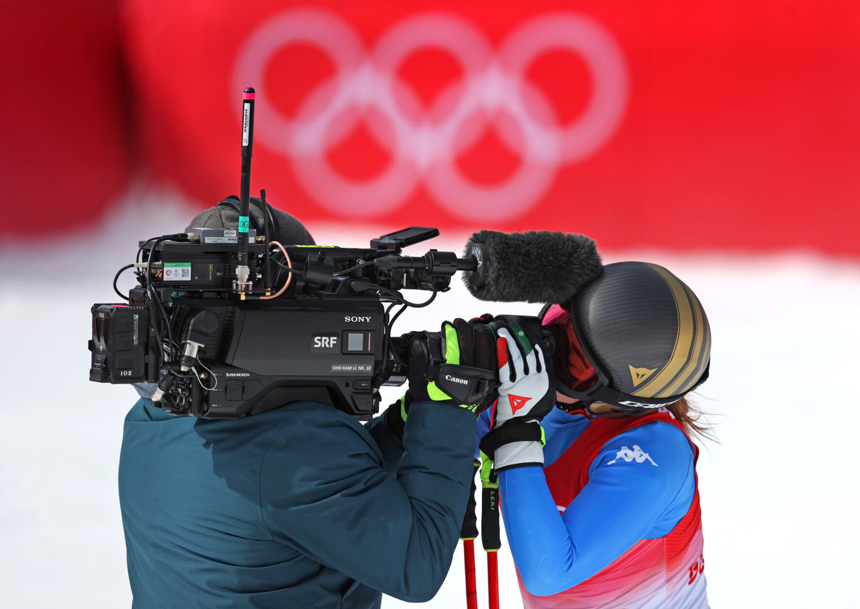 YANQING, CHINA - FEBRUARY 15: Sofia Goggia of Team Italy kisses a TV camera following her run during the Women's Downhill on day 11 of the Beijing 2022 Winter Olympic Games at National Alpine Ski Centre on February 15, 2022 in Yanqing, China. (Photo by Alex Pantling/Getty Images)
