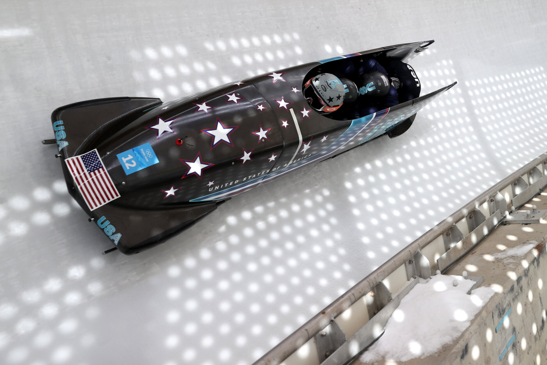 <p>Hunter Church, Kristopher Horn, Joshua Williamson and Charlie Volker of Team United States slide during the 4-man Bobsleigh training heats on day 12 of Beijing 2022 Winter Olympic Games at National Sliding Centre on February 16, 2022 in Yanqing, China. (Photo by Julian Finney/Getty Images)</p>
