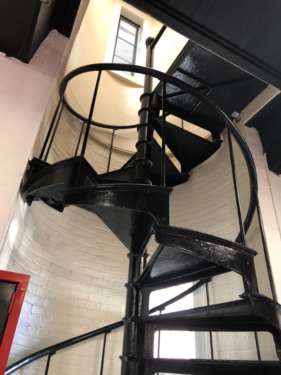 <p>A spiral staircase remains as part of the renovation. It was installed to keep horses from going upstairs at the firehouse.</p>
